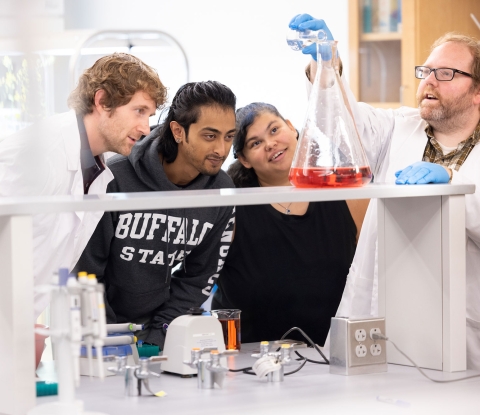 Students and faculty in a lab