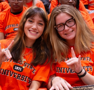 Students wearing Buffalo State University t-shirts