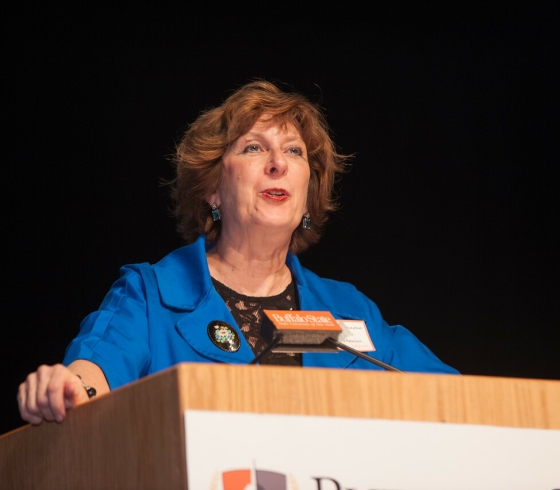 Wendy Paterson speaking at a lectern